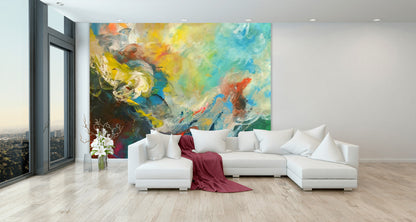 Wandteppich FOREST GUMP 250 x 200 cm an weißer Wand hinter U-förmigem weißen Sofa mit weinroter Decke mit weitem Blick aus einem Hochhausfenster